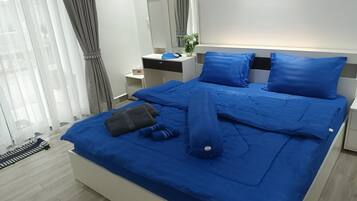 3 habitaciones, tabla de planchar con plancha, wifi y ropa de cama