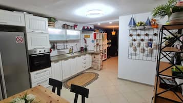 Classic Apartment | Private kitchen | Full-sized fridge, microwave, electric kettle