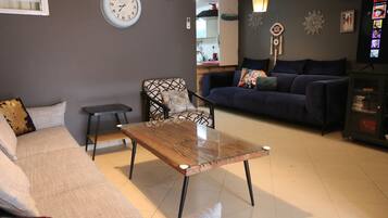 Departamento clásico | Área de sala de estar | Televisión de pantalla plana