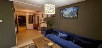 Classic Apartment | Living area | Flat-screen TV