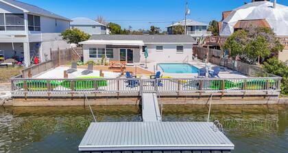 Heated Pool • Waterfront • Private Beach • Dock • Kayaks