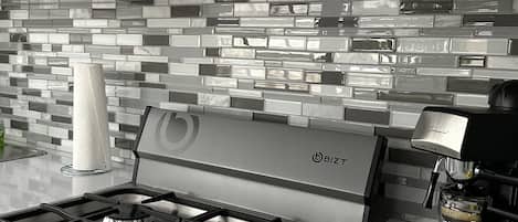 Microwave, oven, coffee/tea maker, cookware/dishes/utensils