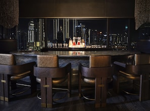 5 bars/lounges, rooftop bar