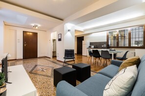 Business Apartment | Living area | 35-inch TV with digital channels