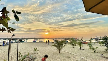 On the beach, white sand