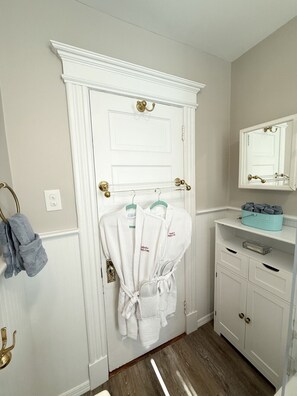 Bathtub, hair dryer, towels