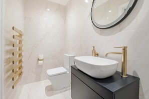 Shower, eco-friendly toiletries, hair dryer, bidet