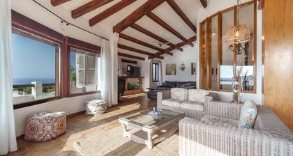 Breathtaking Bayfront Mansion: Stunning Views of Fornells Bay