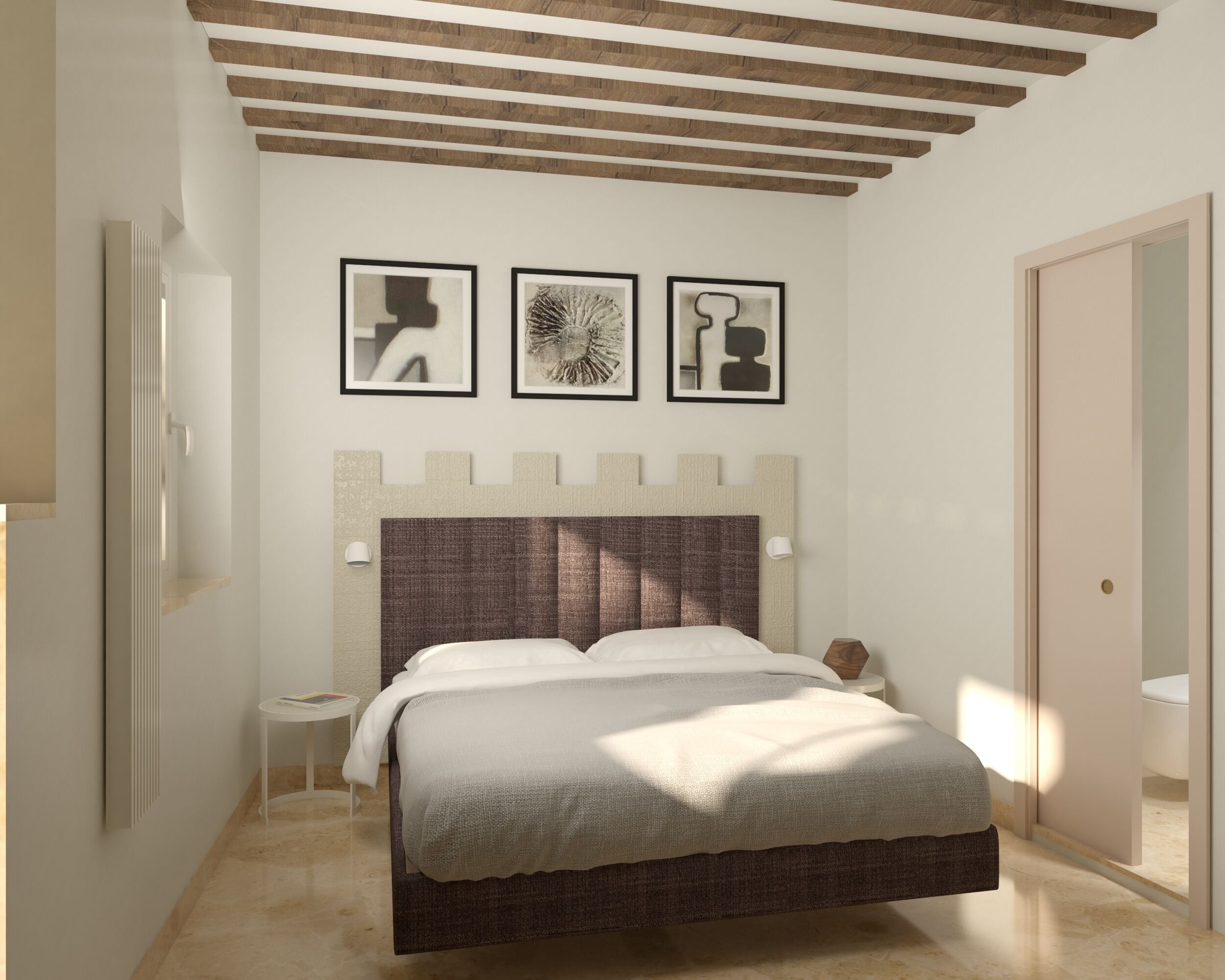 Un dormitorio con cama, una mesita de noche, una lámpara de pared y tres cuadros enmarcados sobre la cama.