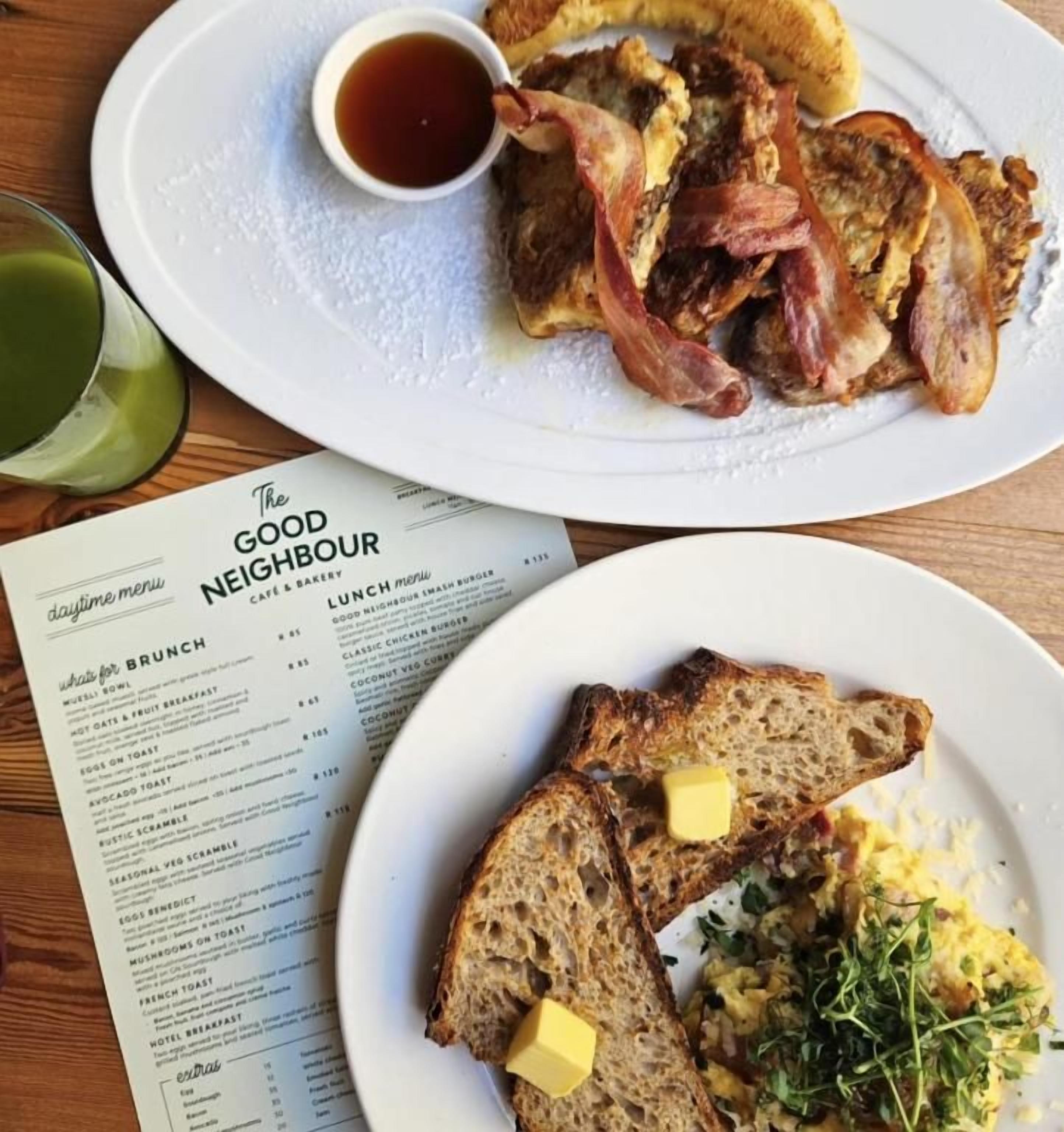 A menu with brunch options and a plate of food with toast and scrambled eggs.