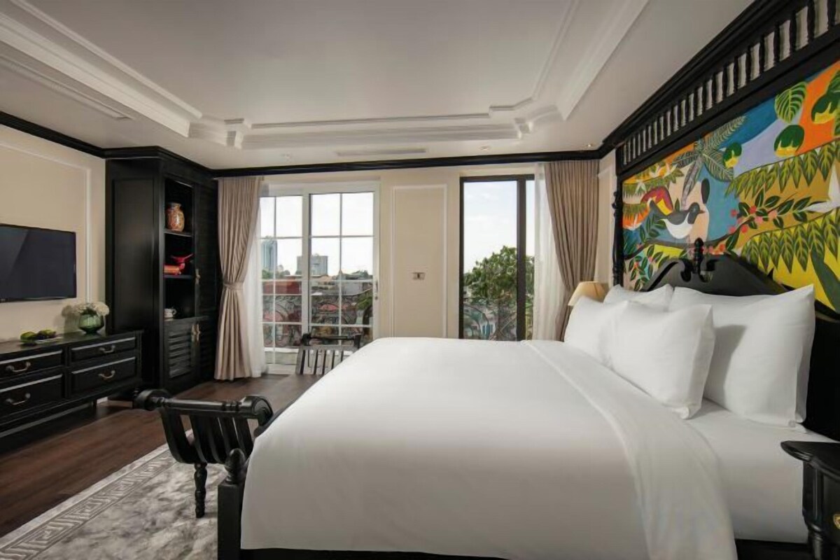 Premium bedding, pillow-top beds, free minibar items, in-room safe