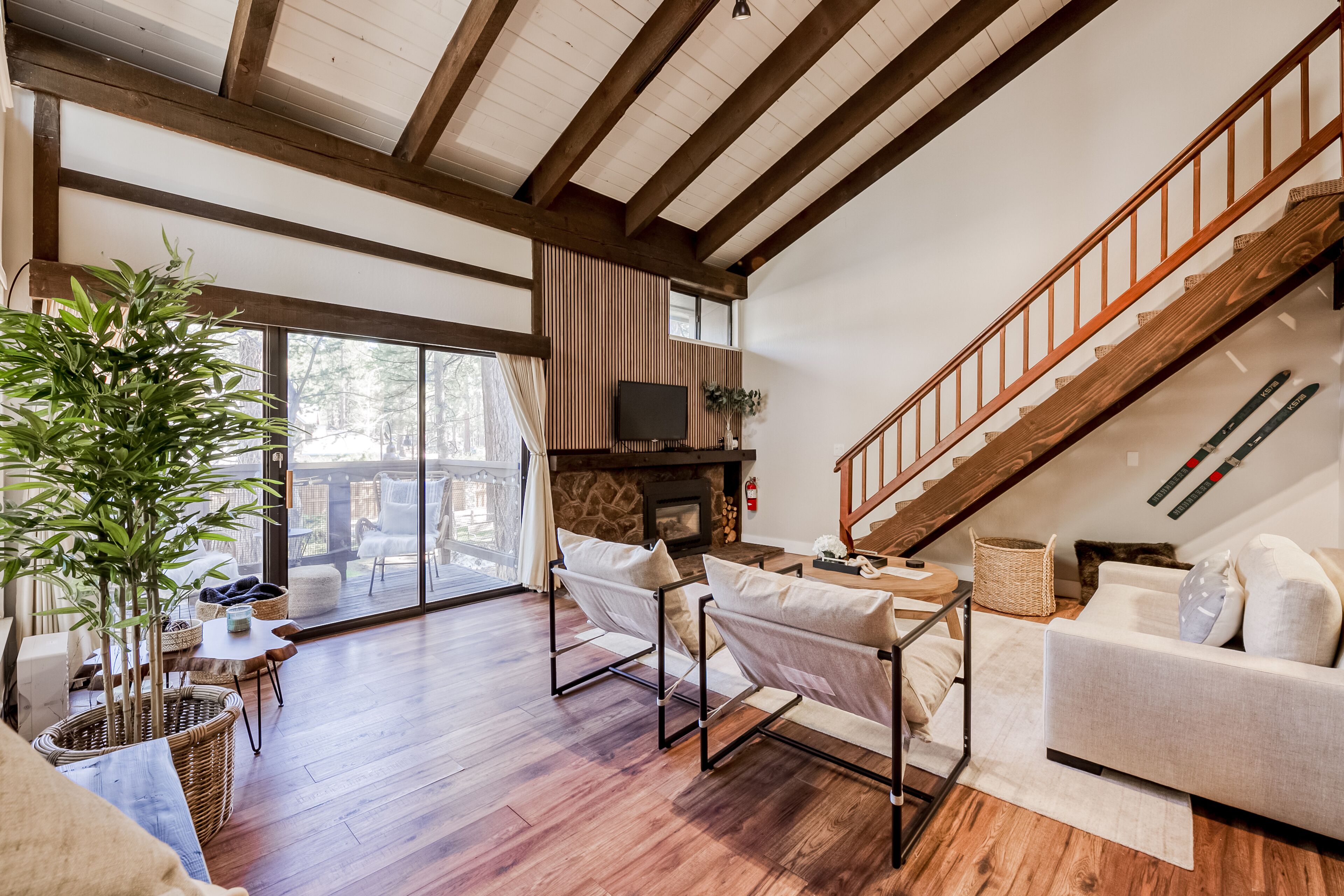 Luxurious townhome with lake views, private beach, fireplace, & W/D