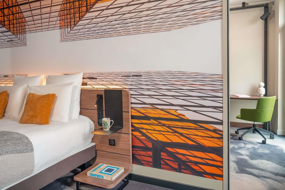 Ropa de cama de alta calidad, minibar, caja fuerte y escritorio
