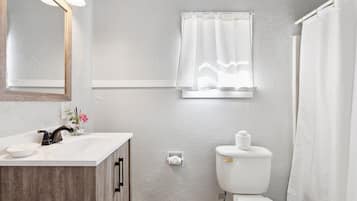 Hair dryer, towels, soap, shampoo