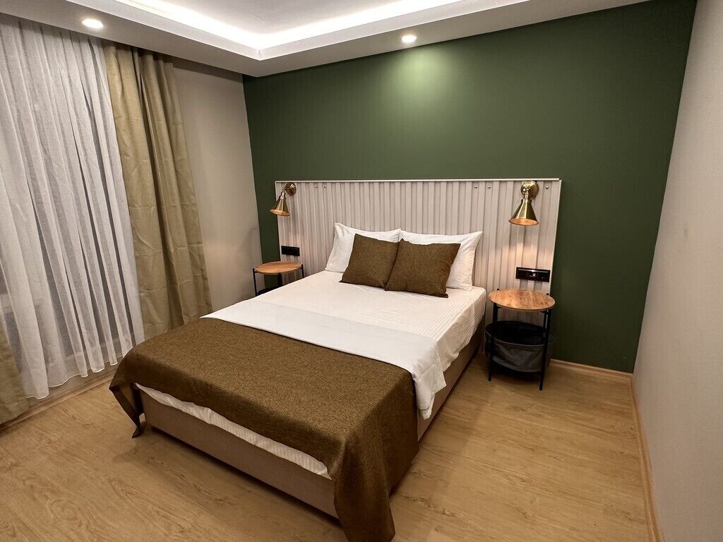 Deluxe-Doppelzimmer, Stadtblick | Allergikerbettwaren, Minibar (mit einigen kostenlosen Artikeln)