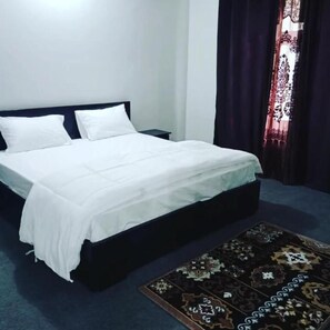 1 chambre, fer et planche Ă repasser, Wi-Fi gratuit, draps fournis