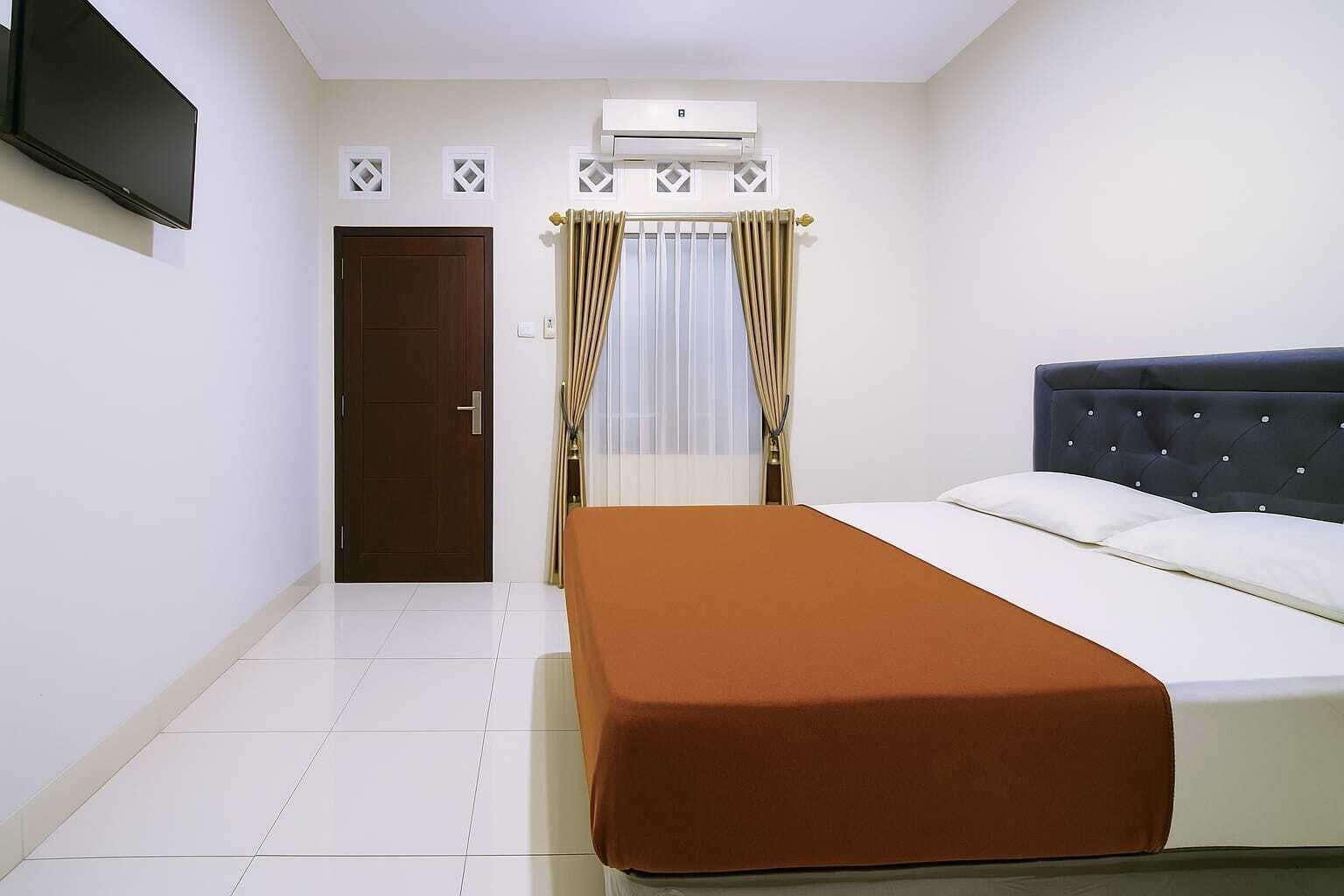 Deluxe Single Room | Down comforters, individually furnished, blackout drapes, soundproofing