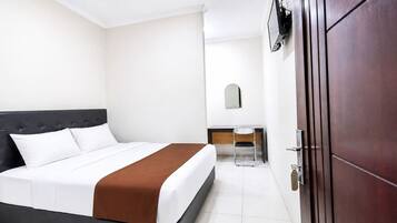 Cubrecamas, muebles diferentes y cortinas blackout