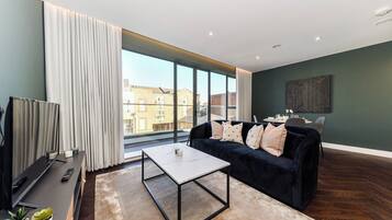 Apartment | Living area | 42-inch Smart TV with cable channels, Netflix, streaming services