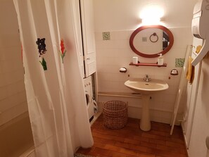 Hair dryer, bidet, towels, soap