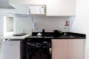 Apartamento standard | Cozinha privada | Geladeira, micro-ondas, cooktop, máquina de café expresso