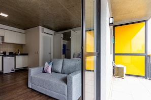 Standard Apartment | Living area | 43-inch TV with cable channels
