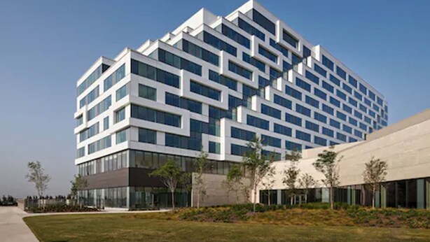 A modern building with a geometric facade, large windows, and a flat roof. - Great Canadian Casino Resort Toronto (Toronto)