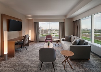 In-room safe, desk, laptop workspace, blackout drapes at Great Canadian Casino Resort Toronto