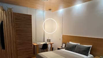 Estudio Deluxe | Ropa de cama de alta calidad y caja de seguridad en la habitación