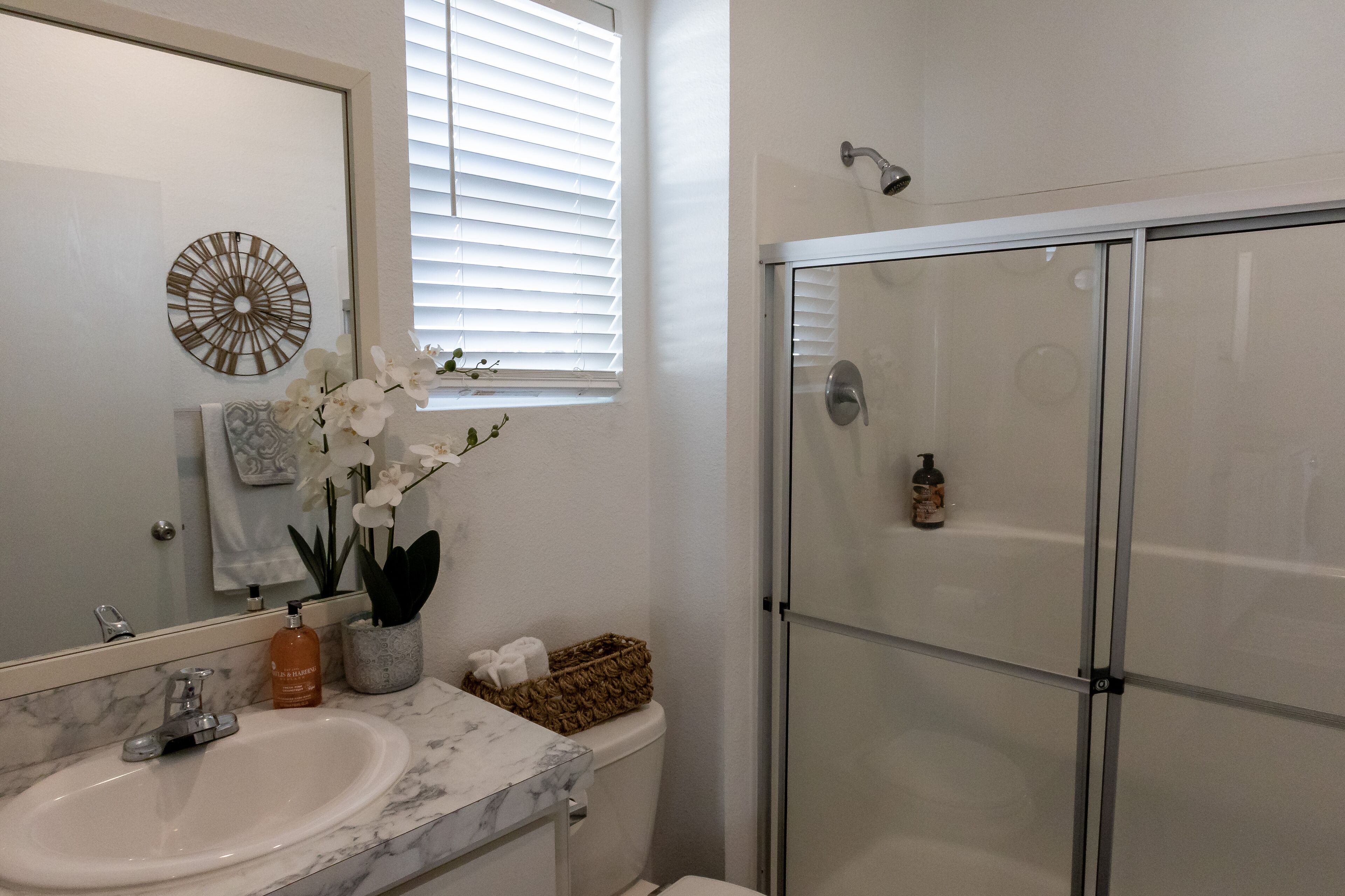 Shower, hair dryer, towels, soap