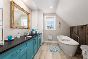 Bathtub, hair dryer, towels