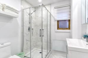 Bathtub, hair dryer, towels