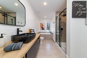 Bathtub, hair dryer, towels