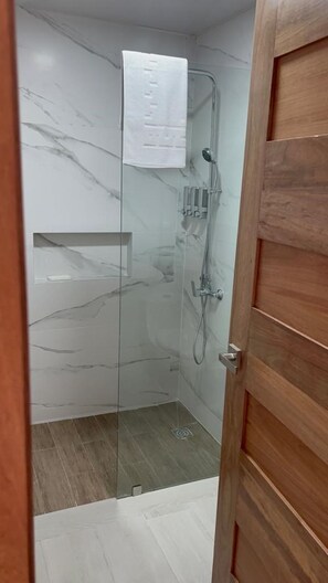 Shower, hair dryer, towels, soap