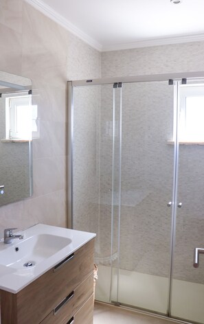 Hair dryer, bidet, towels, soap