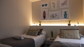 2 habitaciones, caja de seguridad en la habitación y escritorio