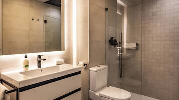 Shower, towels, toilet paper