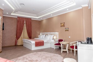 Deluxe Quadruple Room | Egyptian cotton sheets, premium bedding, blackout curtains - The Royal Hotel (Samarkand)