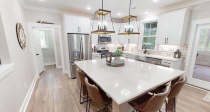 New property at Kerr Lake with dock! Family-sized w/ game room and large porch!