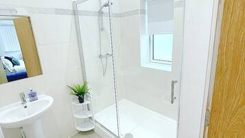 Hair dryer, towels, soap, shampoo