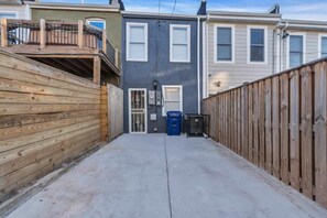 Stroll through this charming alleyway lined with two-story buildings featuring simple, functional designs.