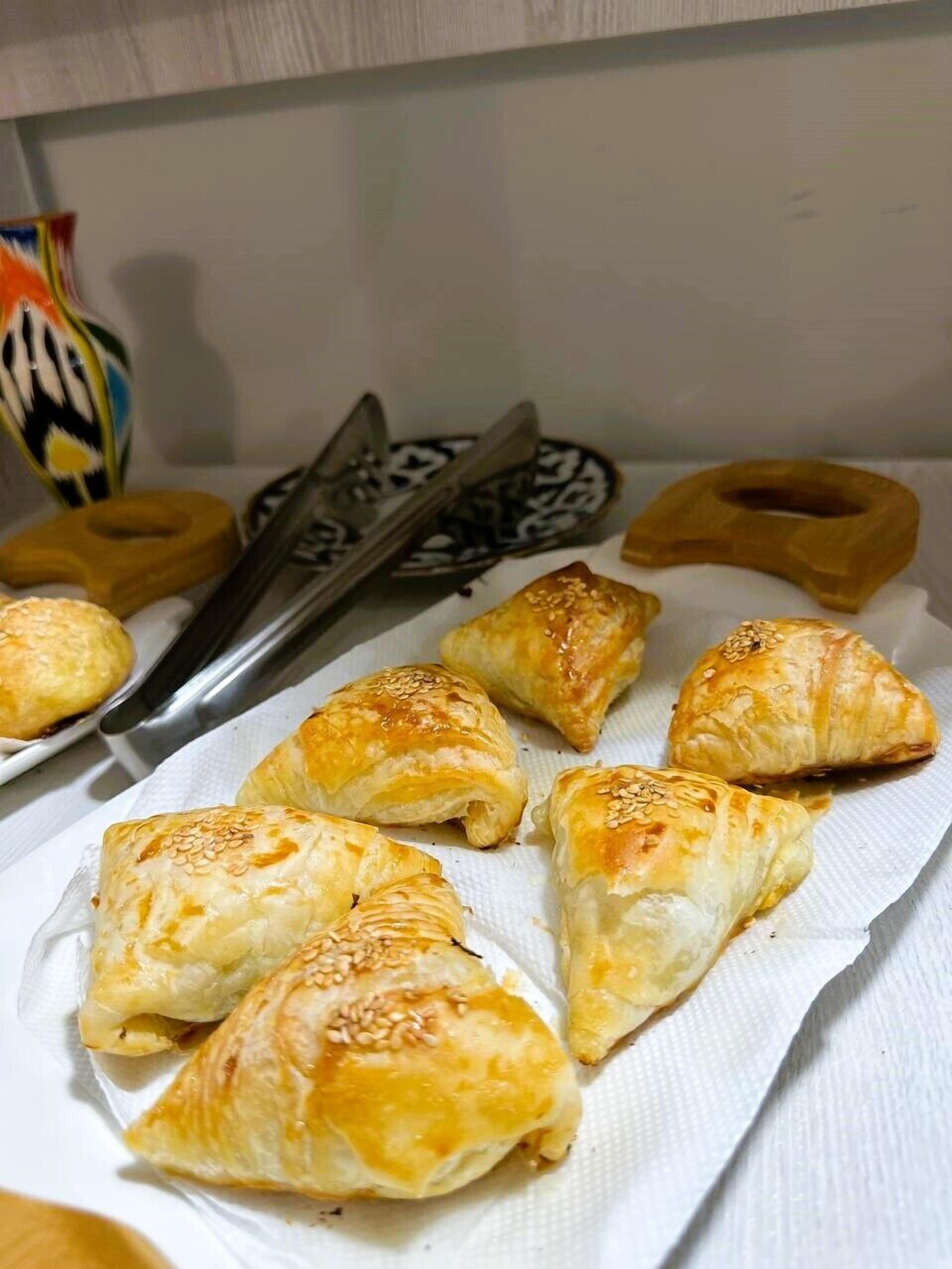 A tray of pastries on a paper towel.