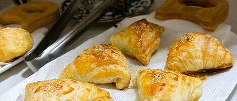 A tray of pastries on a paper towel.