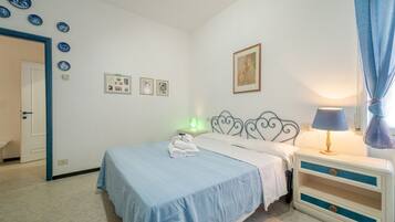 2 dormitorios, tabla de planchar con plancha, wifi