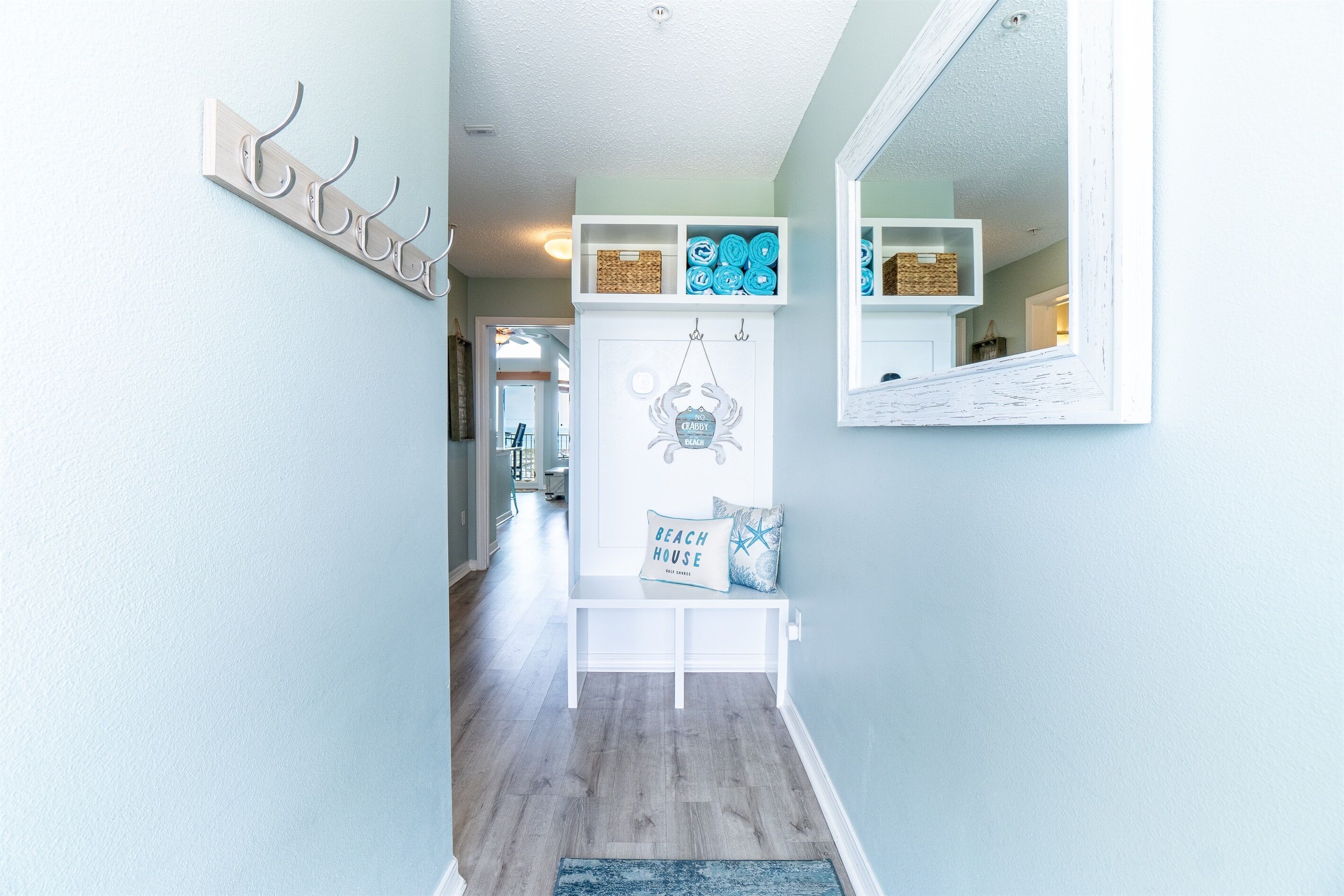 Welcome to our beachside retreat! Find storage and towels for your perfect day by the sea