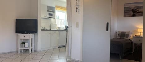 1 dormitorio, tabla de planchar con plancha, wifi