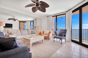 Condo, Multiple Beds, Balcony, Ocean View | Living area | 50-inch flat-screen TV with cable channels, TV