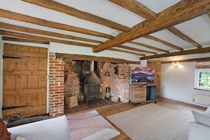 Ferienhaus | Wohnbereich | Kamin