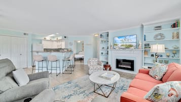 Condo, Multiple Beds, Balcony | Living area | 43-inch flat-screen TV with cable channels, TV