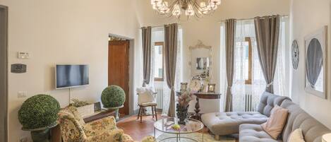 Basic Apartment, Multiple Beds | Living area | TV